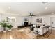 Bright living room with fireplace and hardwood floors at 4839 E Laurel Ln, Scottsdale, AZ 85254