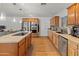 Modern kitchen with stainless steel appliances and an island at 5111 S Clark Dr, Tempe, AZ 85282