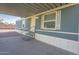 Mobile home exterior with covered porch and steps at 549 E Mckellips Rd # 44, Mesa, AZ 85203