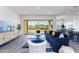 Spacious living room with sliding glass doors leading to a patio and backyard at 562 N Sun Rd, Apache Junction, AZ 85119
