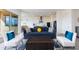 Open concept living space with a blue sofa and a view of the kitchen at 562 N Sun Rd, Apache Junction, AZ 85119