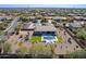 Aerial view showcasing the house, pool, and expansive backyard at 7802 W Artemisa Ave, Peoria, AZ 85383