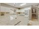 Kitchen with granite countertops and island at 8689 E Windrose Dr, Scottsdale, AZ 85260
