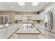 Bright kitchen, granite counters, and stainless steel appliances at 8689 E Windrose Dr, Scottsdale, AZ 85260