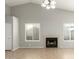 Living room with fireplace and neutral color walls at 10018 N 66Th Ln, Glendale, AZ 85302