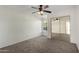 Spacious bedroom with ceiling fan and mirrored closet doors at 1014 E Michigan Ave, Phoenix, AZ 85022