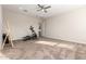 Spacious exercise room with elliptical machine at 10451 W Salter Dr, Peoria, AZ 85382