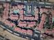 Aerial view of community with pool and numerous buildings at 10610 S 48Th St # 1078, Phoenix, AZ 85044