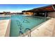 Large community pool with a 'Magma Ranch Vistas' logo at 13129 E Larrea Ln, Florence, AZ 85132