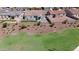 Aerial view of a house with a backyard and surrounding neighborhood at 1417 E Mark Ct, Casa Grande, AZ 85122