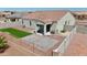 Artificial turf, patio, and a fenced backyard at 1417 E Mark Ct, Casa Grande, AZ 85122