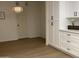 Modern kitchen with white shaker cabinets and quartz countertops at 1745 E Glade Ave, Mesa, AZ 85204