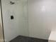 Large walk-in shower with hexagonal tile flooring and glass enclosure at 1745 E Glade Ave, Mesa, AZ 85204