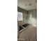 Modern bathroom with a large walk-in shower and marble tile at 17913 W Desert View Ln, Goodyear, AZ 85338