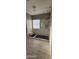 Bathroom with a large walk-in shower and marble tile at 17913 W Desert View Ln, Goodyear, AZ 85338