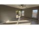 Bright bedroom with sliding glass doors leading to the backyard at 17913 W Desert View Ln, Goodyear, AZ 85338