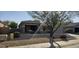 Single story home with a front yard and desert landscaping at 17913 W Desert View Ln, Goodyear, AZ 85338