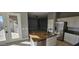 Open kitchen with island, granite countertops, and stainless steel appliances at 17913 W Desert View Ln, Goodyear, AZ 85338