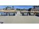 Lake dock with benches near a gazebo at 17913 W Desert View Ln, Goodyear, AZ 85338