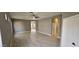 Spacious living room with light wood floors and neutral walls at 17913 W Desert View Ln, Goodyear, AZ 85338