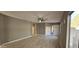 Bright living room featuring hardwood floors and neutral walls at 17913 W Desert View Ln, Goodyear, AZ 85338