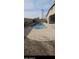 Inviting kidney-shaped pool with surrounding gravel at 17913 W Desert View Ln, Goodyear, AZ 85338