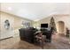 Spacious living room with leather furniture and Christmas tree at 1889 Leisure World --, Mesa, AZ 85206