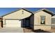 Newly constructed home with neutral exterior and a two-car garage at 25401 N Selene Dr, Florence, AZ 85132