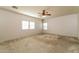 Bright bedroom featuring neutral walls and plush carpeting at 2740 E Courtney St, Gilbert, AZ 85298