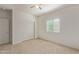 Spacious bedroom featuring double door closet and carpet flooring at 43632 W Yucca Ln, Maricopa, AZ 85138