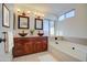 Double vanity bathroom with soaking tub at 4521 W Milky Way, Chandler, AZ 85226