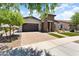 House exterior with driveway and landscaping at 4703 N 206Th Dr, Buckeye, AZ 85396