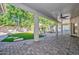 Covered patio with brick flooring and ceiling fan at 6344 W Tether Trail Trl, Phoenix, AZ 85083