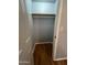 A simple closet with wood-look floors and a hanging rod at 771 E Pepper Dr, Casa Grande, AZ 85122