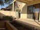 Covered patio adjacent to the house with a garden at 771 E Pepper Dr, Casa Grande, AZ 85122