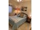 Bedroom with double bed, nightstands, and artwork at 7950 E Keats Ave # 194, Mesa, AZ 85209