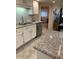 Modern kitchen featuring granite countertops and ample cabinet space at 7950 E Keats Ave # 194, Mesa, AZ 85209