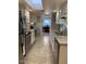 Open concept kitchen with skylight and stainless steel appliances at 7950 E Keats Ave # 194, Mesa, AZ 85209