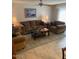 Spacious living room with ample seating and a ceiling fan at 7950 E Keats Ave # 194, Mesa, AZ 85209