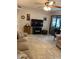 Living room featuring a large TV and ample seating at 7950 E Keats Ave # 194, Mesa, AZ 85209