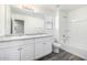 Bathroom with double vanity and bathtub/shower combo at 837 E Agua Fria Ln, Avondale, AZ 85323