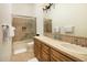 Bathroom with a shower/tub combo and double vanity at 10803 E La Junta Rd, Scottsdale, AZ 85255
