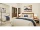 Cozy bedroom with a queen-sized bed and built-in closet at 10803 E La Junta Rd, Scottsdale, AZ 85255