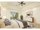 Spacious main bedroom with sliding glass doors leading to a private patio at 10803 E La Junta Rd, Scottsdale, AZ 85255