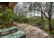 Relaxing patio with lounge chairs and desert landscaping at 10803 E La Junta Rd, Scottsdale, AZ 85255