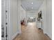 Bright entryway with herringbone patterned hardwood floors at 1439 E Mead Dr, Gilbert, AZ 85298