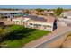 Aerial view of house showcasing solar panels and backyard at 21391 E Orchard Ln, Queen Creek, AZ 85142