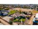 Aerial view of a large house with a spacious yard at 21391 E Orchard Ln, Queen Creek, AZ 85142