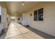 Covered patio with access to backyard and ceiling fan at 21391 E Orchard Ln, Queen Creek, AZ 85142