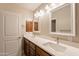 Elegant bathroom with double vanity and modern fixtures at 21391 E Orchard Ln, Queen Creek, AZ 85142
